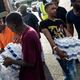 Cases of bottled water were handed out at a Mississippi Rapid Response Coalition distribution site on August 31, 2022, in Jackson, Mississippi. Jackson is experiencing a third day without reliable water service after river flooding caused the main treatment facility to fail. Late Tuesday night, President Joe Biden declared an emergency amid the crisis. (